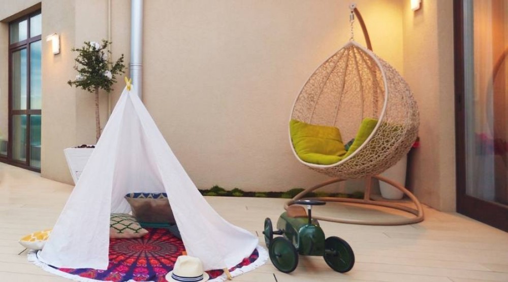 Wie richtet man einen Balkon für ein Kind ein?